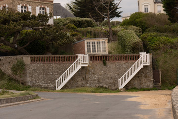 White double stairs leading to the garden