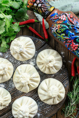 Khinkali own production with broth inside from meat of pig, beef, ram.