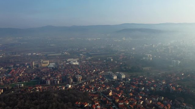 Drone photo of the city of Nis at foggy morning, Serbia city footage