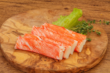 Crab sticks served salad leaves