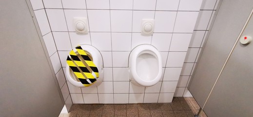 Urinal closed due to Social Distancing in Corona Crisis