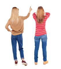 Back view of couple in sweater showing thumbs up.