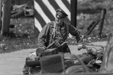 Black and white photography, reconstruction of a military battle World War II