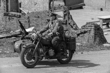 Black and white photography, reconstruction of a military battle World War II
