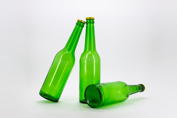 Set of green Glass bottles of beer. Isolated on white background