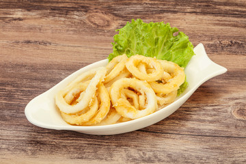 Roasted squid rings with salad