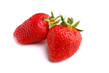 A pair of strawberries on white isolated background