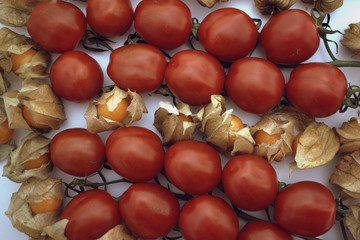 Obraz na płótnie Canvas Top view. Physalis with cherry tomatos