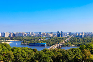 Fototapeta premium Aerial view of Metro bridge and the Dnieper river in Kiev, Ukraine. Kyiv cityscape