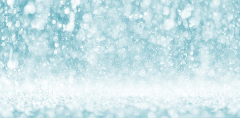 blue color tone of close up rain water drop falling to the floor in rainy season	