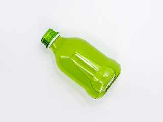 A bottle of  juice with cap on a white background. Can be used for your design and branding. High resolution photo.