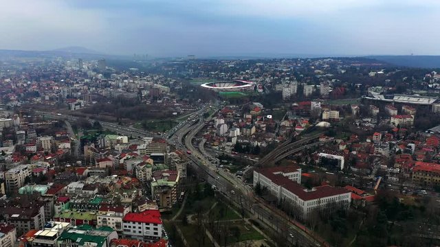 Belgrade aerial view of city, traffic on the streets with Stadium football view