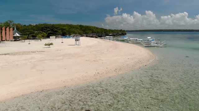 Flying over beautiful beach of tiny Virgin Island, Bantayan, Cebu, Philippines