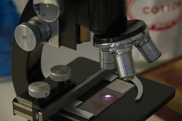 closeup of microscopes with lab sample