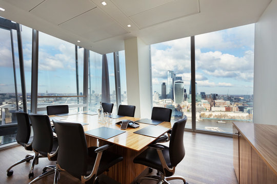Modern highrise conference room overlooking city, London, UK