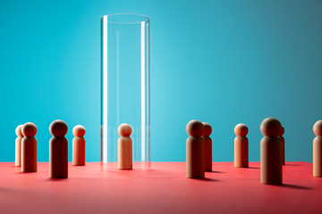 Glass cylinder protecting wooden pawn chess piece