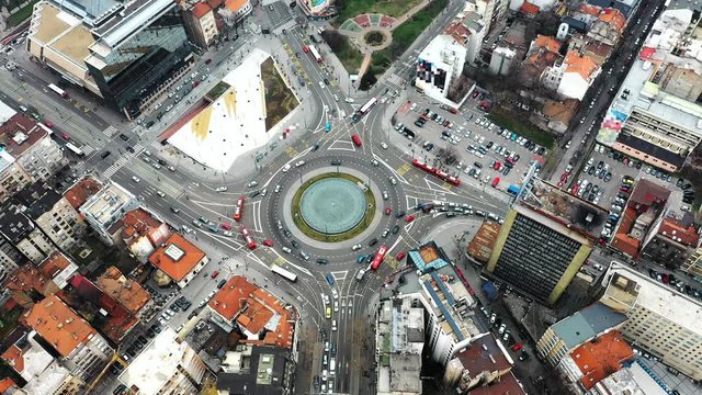 Aerial view of circle road in Belgrade, street with car traffic, down view from the top