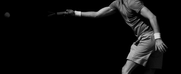 Man tennis player in action. Black and white