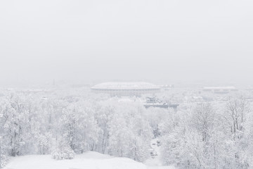 Luzhniki Stadium on the Sparrow Hills in heavy snow. Blizzard. Winter Park.