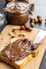 Toast bread with hazelnut spread. Sweet chocolate cream.