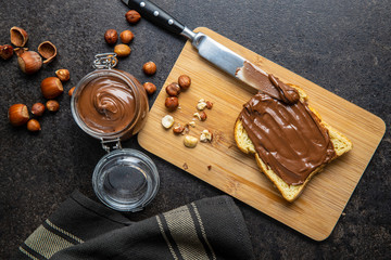 Toast bread with hazelnut spread. Sweet chocolate cream.