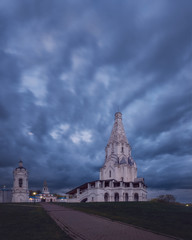 Church of the Ascension in Kolomenskoye. Cloudy, thunderclouds over the park.