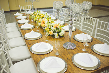 community table decorated with flowers for buffet 