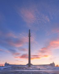 Snowstorm in Victory Park on Poklonnaya Gora. Winter sunset in the city