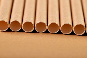 Disposable tableware made of environmental materials. Eco-friendly cookware, zero waste production from recycled materials. Paper plates, glasses, cocktail tubes. Wooden forks and knives. 