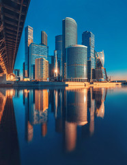 Business Center Moscow-City. Towers and their reflection in the Moscow River. Modern architecture. Moscow International Business Center "Moscow-City"
