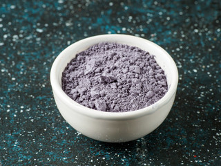 Blue butterfly powder in the white plate.