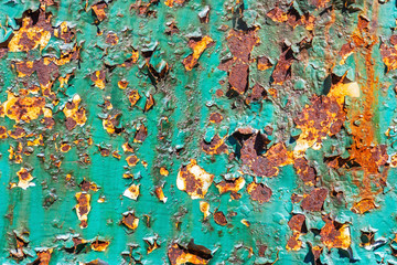 Peeling green paint.