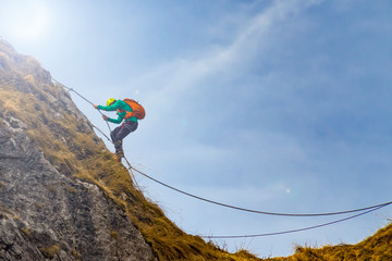 Climber in the alps at sunset