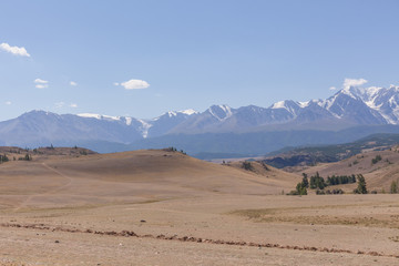Fototapeta na wymiar View of Belukha Mountain. Russia. Belukha Mountain is part of the World Heritage Site entitled Golden Mountains of Altai.