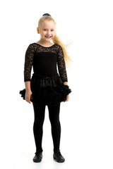 Cute little girl gymnast getting ready to perform a difficult ex