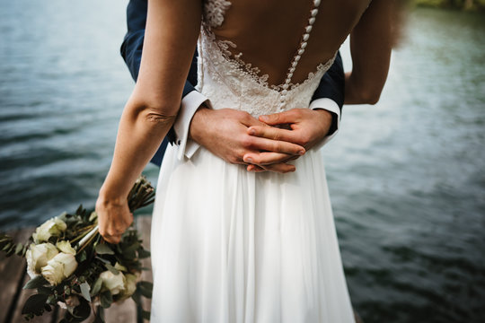 photo of a wedded couple at a lake