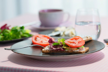 Delicious and healthy vegan breakfast with toast and various vegetables