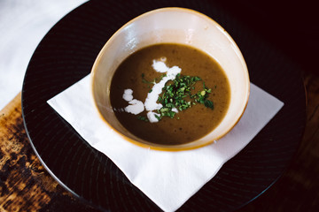 photo of a hot brown soup bowl