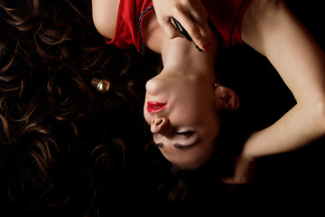 Tender photo of a beautiful girl with perfume portrait photo. Girl with female perfume at twilight....