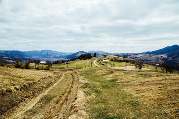 Fototapeta na wymiar Landscape Freeride in the wild Carpathian mountain near big rocks.