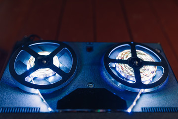 reel to reel audio tape recorder with blue led light strip
