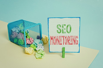 Handwriting text Seo Monitoring. Conceptual photo Tracking the progress of strategy made in the platform Trash bin crumpled paper clothespin empty reminder office supplies tipped