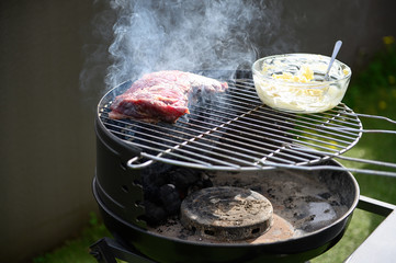 Rump skirt on grill with butter. Selective focus.