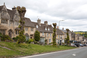 Fototapeta na wymiar Houses on the High Street in Burford, Oxfordshire, UK