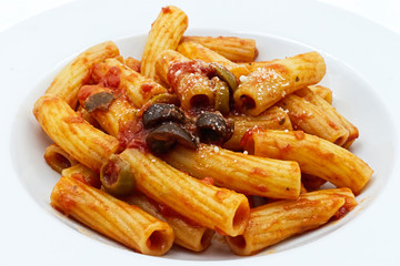 Maccheroni with olive sauce and parmesan. Italian pasta. Close-up