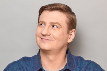 Obraz premium Portrait of blond mature man with happy expression and smiling