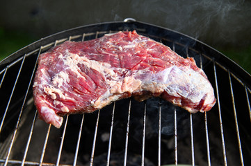 Rump skirt on grill. Selective focus.