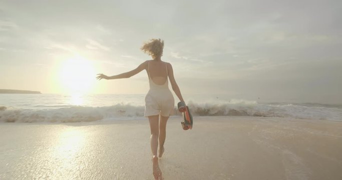 Young girl going to snorkeling with underwater scooter