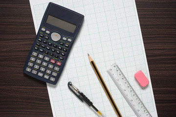 Calculator, empty graph paper and stationeries