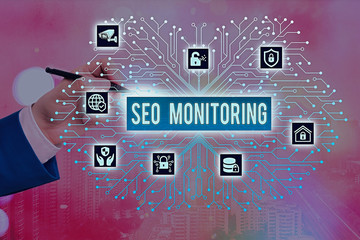 Writing note showing Seo Monitoring. Business concept for Tracking the progress of strategy made in...